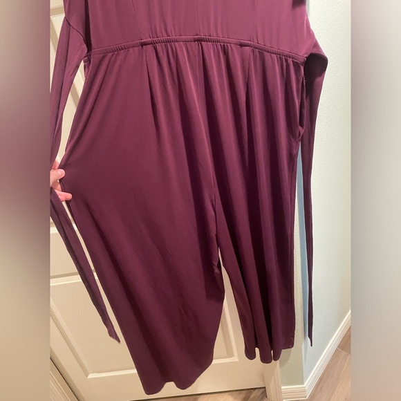 LANE BRYANT Stretchy, Wide Leg, Flutter Sleeve, Faux Wrap Jumpsuit - Picture 11 of 13